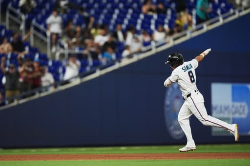 Sanoja hits grand slam, Meyer pitches 6 sharp innings as Marlins rout Braves 12-0