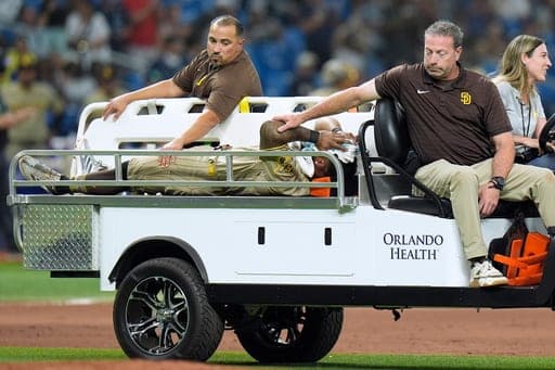 San Diego Padres left fielder Luis Rengifo is carted off the field after getting injured during the seventh inning of a baseball game against the Tampa Bay Rays Saturday, Aug. 29, 2026, in St. Petersburg, Fla. (AP Photo/Chris O'Meara) (AP Photo/Chris O'Meara)