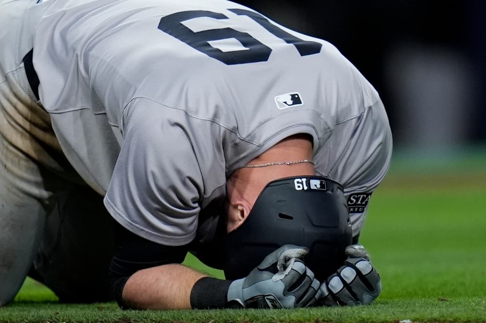 Yankees place Berti on the injured list with a left calf strain and select Smith from Triple-A