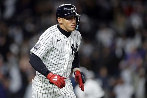 New York Yankees' George Lombard Jr. reacts after hitting a two-run home run during the eighth inning of a baseball game against the Tampa Bay Rays, Thursday, Sept. 24, 2026, in New York. (AP Photo/Adam Hunger) (AP Photo/Adam Hunger)
