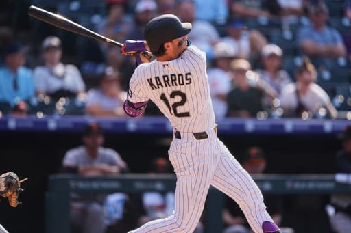 Kyle Karros hits a 3-run homer in the 8th to lift the Rockies past the Giants, 7-6