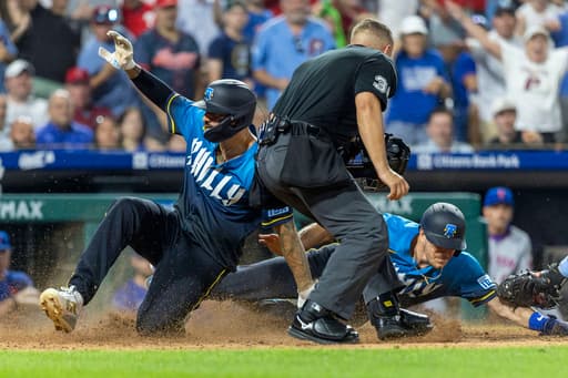 Phillies surge past Mets with six-run seventh inning, claim first place in NL East