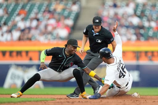 Tigers hit 3 homers in a six-run fifth inning and rout the Diamondbacks 12-2