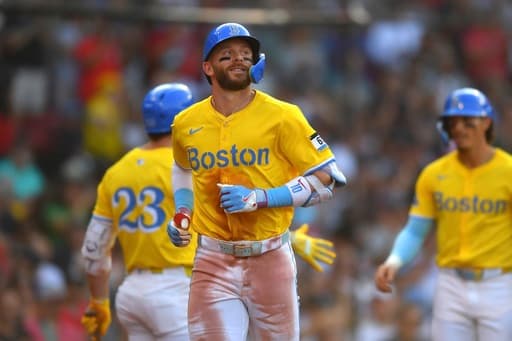 Trevor Story hits a 3-run homer as the Red Sox hold off the Marlins for a 7-5 win