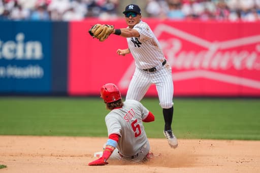 Harper and Schwarber spark the Phillies to a win over the reeling Yankees