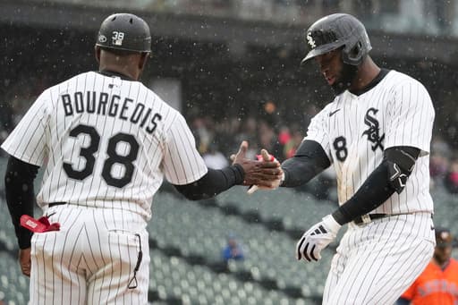 White Sox rally to beat Astros 5-4 in game shortened to 7 innings by rain
