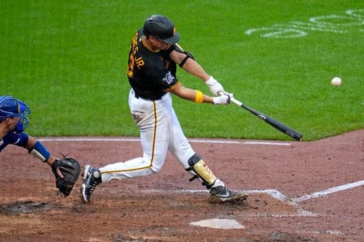 Pittsburgh Pirates' Rafael Flores Jr. hits a two-run home run off Kansas City Royals pitcher Nate Pearson during the eighth inning of a baseball game in Pittsburgh, Sunday, Sept. 20, 2026. (AP Photo/Gene J. Puskar) (AP Photo/Gene J. Puskar)