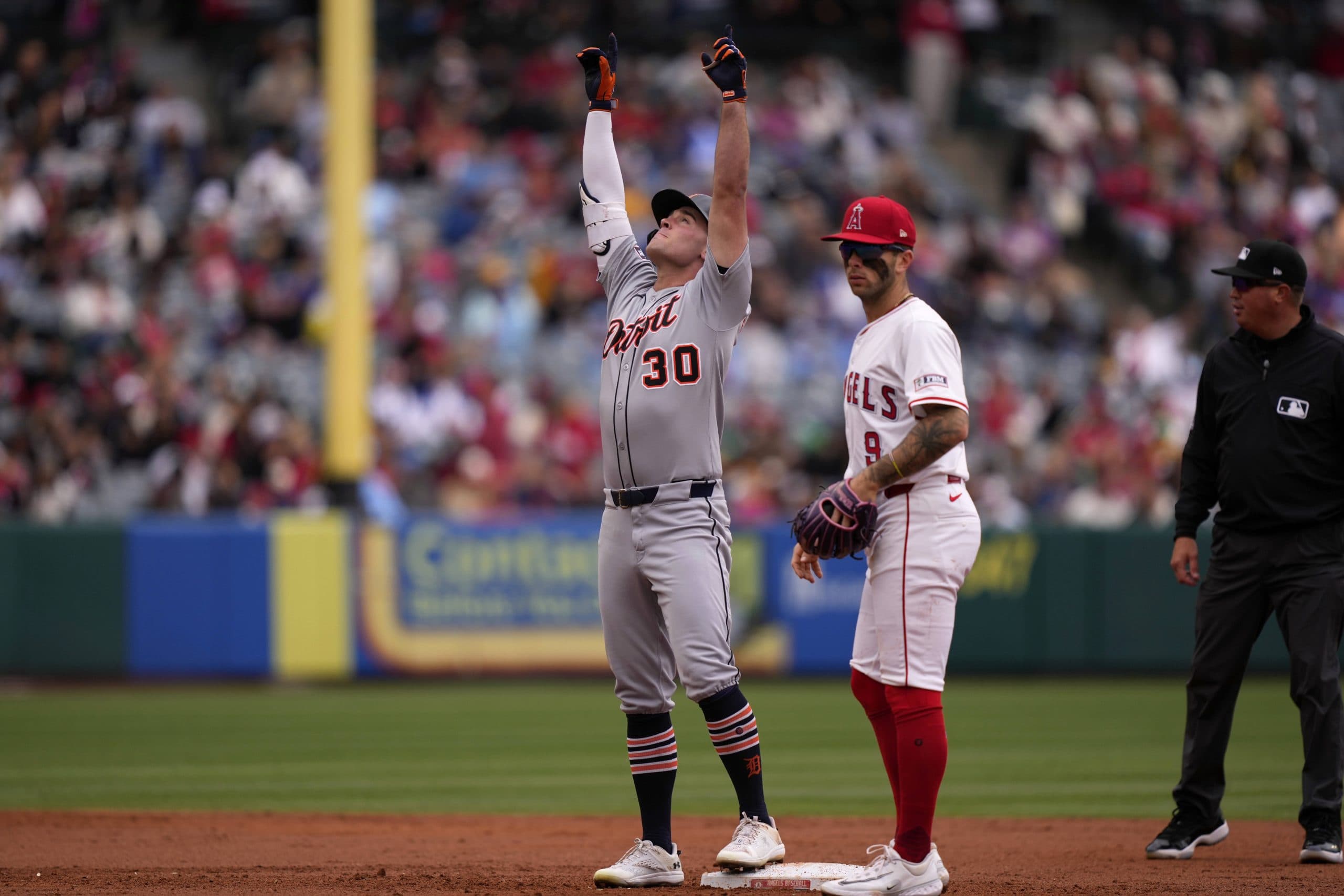 Sweeney and Carpenter each homer and combine to drive in 11 as Tigers pound Angels 13-1