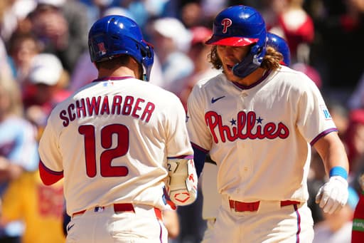 Schwarber, Harper homer to lead Phillies over Diamondbacks 4-3 to stop 3-game skid