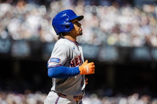 New York Mets' Francisco Lindor walks to first base during the third inning of a baseball game against the New York Yankees, Sunday, Sept. 13, 2026, in New York. (AP Photo/Angelina Katsanis) (AP Photo/Angelina Katsanis)