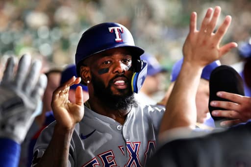 Rangers get 17 hits and hammer Athletics 9-3 for 4th straight win
