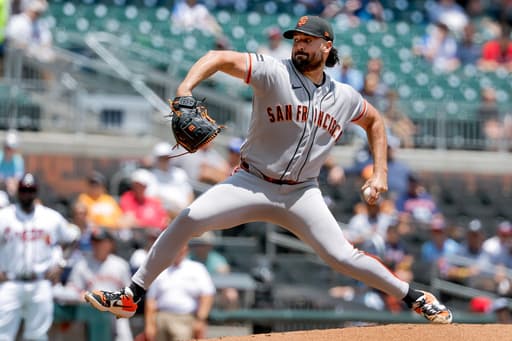 Ray dominant in relief as Giants complete 7-2 win over Braves in Game 1 of doubleheader