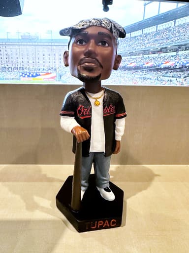Orioles hold Tupac Shakur bobblehead promotion, and his sister throws out the ceremonial first pitch