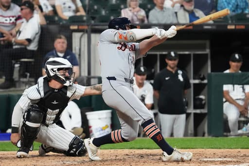 Carpenter hits 3 homers as the Tigers reach 40 wins by pounding the White Sox 13-1