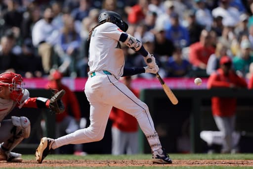 Surging Mariners beat Angels 9-3; Trout leaves game early with sore knee