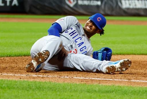 Cubs pitcher Edward Cabrera carted off the field with a left leg injury