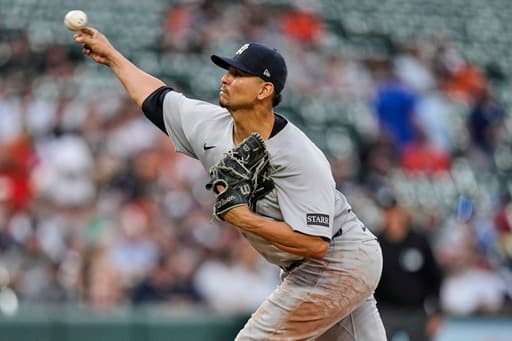 Depleted Braves acquire pitcher Carlos Carrasco from Yankees for cash considerations