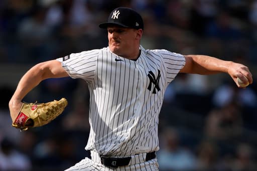 Cole, Yankees hold off Braves 5-4 in matchup of Cy Young winners