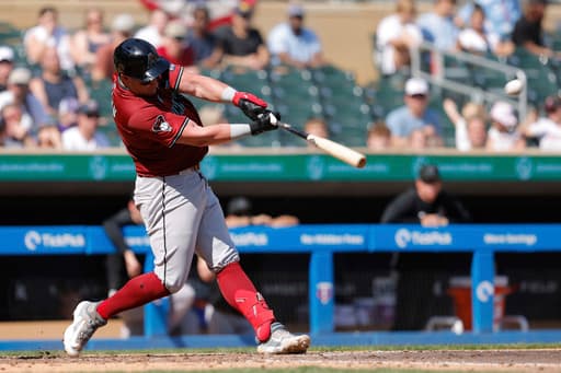 McCann homers and drives in 4 runs to help the Diamondbacks beat the Twins, 6-4