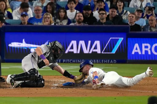 Rockies rally past the Dodgers 4-3 after 2 errors in the eighth