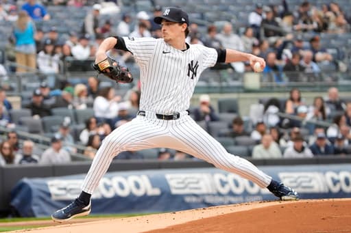 Fried wins 5th straight start and Yankees rout wild Gausman, Blue Jays 11-2 in doubleheader opener