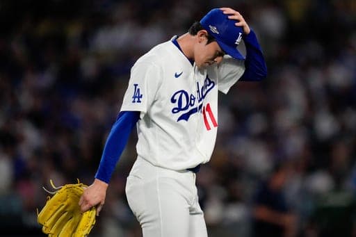 Los Angeles Dodgers pitcher Roki Sasaki leaves the game during the eighth inning of Game 3 of baseball's National League Championship Series between the Milwaukee Brewers and the Los Angeles Dodgers, Wednesday, Oct. 14, 2026, in Los Angeles. (AP Photo/Ashley Landis) (AP Photo/Ashley Landis)
