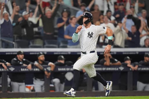 Judge reaches 50 homers for 4th time, hits pair as Yanks tie for AL East lead by beating White Sox