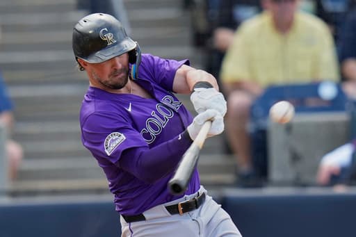 Doyle and Farmer help the Rockies beat the Rays 2-1