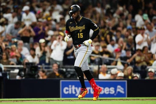 Pittsburgh Pirates' Oneil Cruz heads to home plate after hitting a solo home run against the San Diego Padres in the ninth inning of a baseball game Tuesday, Aug. 25, 2026, in San Diego. (AP Photo/Derrick Tuskan) (AP Photo/Derrick Tuskan)