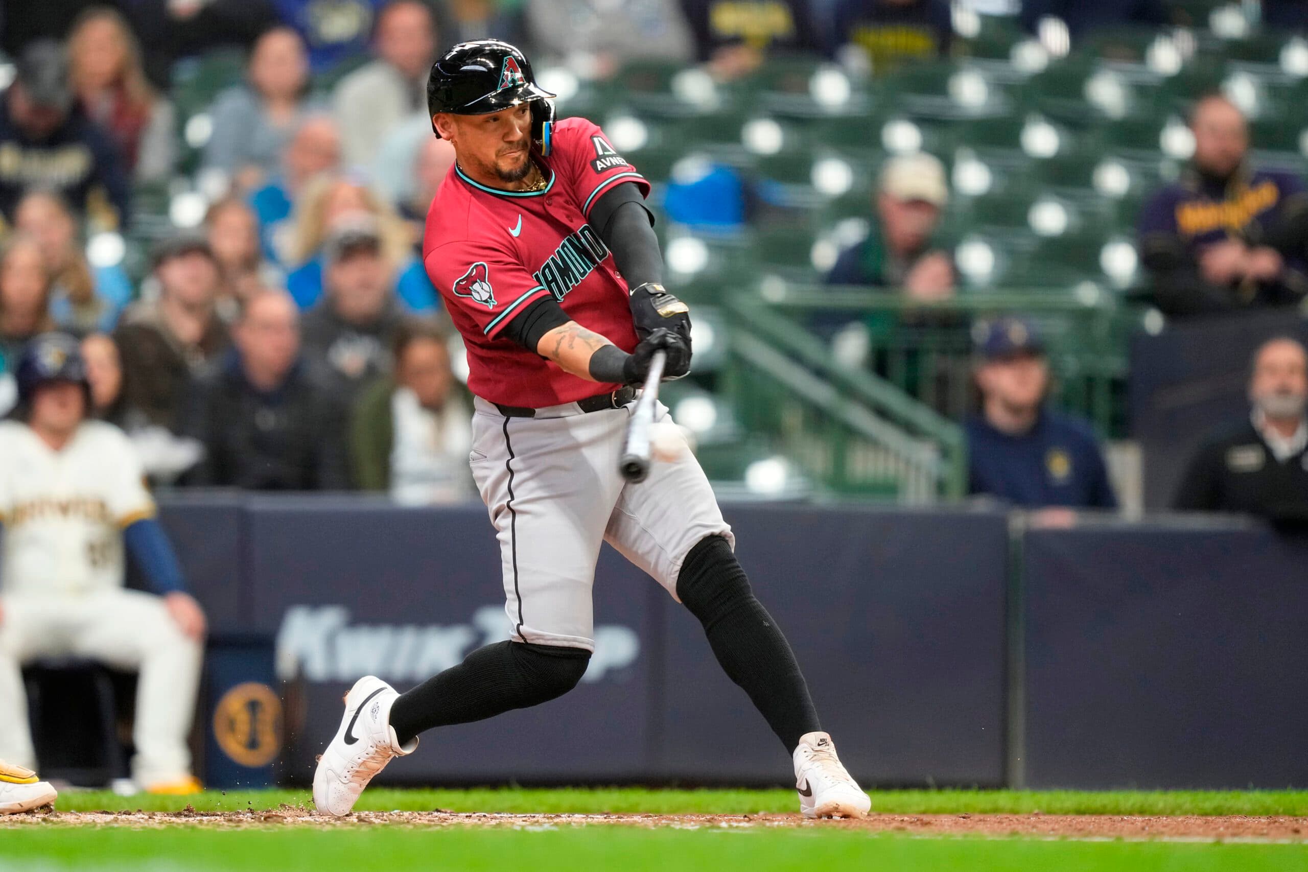 Arizona Diamondbacks' Ildemaro Vargas hits a single during the fourth inning of a baseball game against the Milwaukee Brewers, Thursday, April 30, 2026, in Milwaukee. (AP Photo/Kayla Wolf)