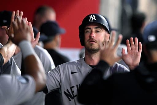 New York Yankees Cody Bellinger celebrates in there dugout after scoring a run against the Los Angeles Angels in the fourth inning of a baseball game Wednesday, Sept. 2, 2026, in Anaheim, Calif. (AP Photo/Wally Skalij) (AP Photo/Wally Skalij)