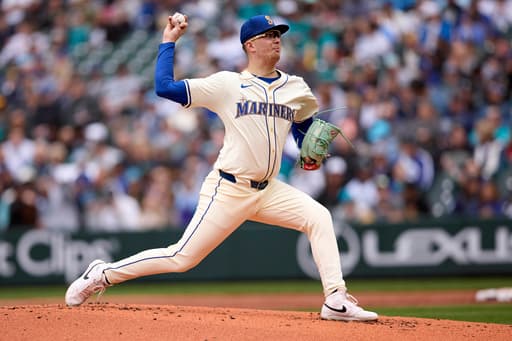 Cal Raleigh hits 10th homer, Logan Evans wins in debut as the Mariners beat the Marlins 7-6