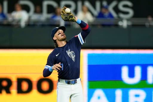 Bobby Witt Jr. leaves game with low back spasms