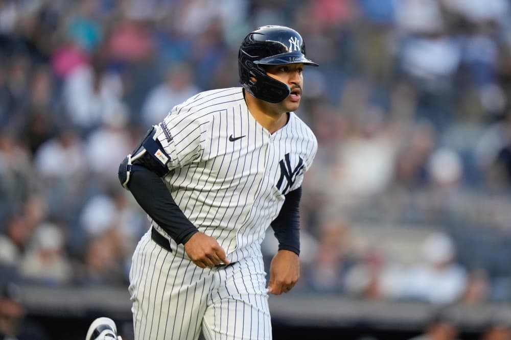 Boone speaks to Grisham about lack of hustle on error play, says it was ‘a bad look’