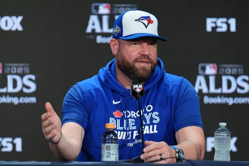 Hat trick: The Blue Jays think their 1992 World Series-style caps are a lucky charm