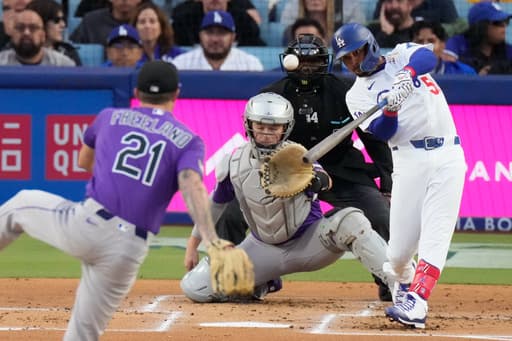 Betts blasts 2 homers and drives in 5 as the Dodgers crush the Rockies 15-6