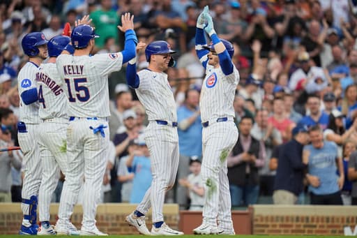 Kelly homers twice, Tucker hits go ahead shot as Cubs outslug Diamondbacks 13-11