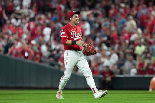 A leaping catch, happy tears, and a win: How TJ Friedl saved the Reds