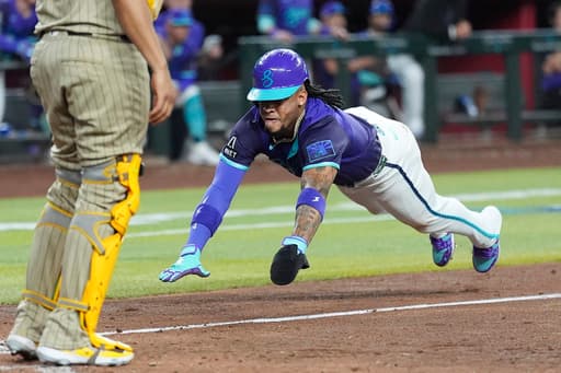 Carroll, Naylor homers send Diamondbacks past Padres 5-1 and over the .500 mark at 35-34