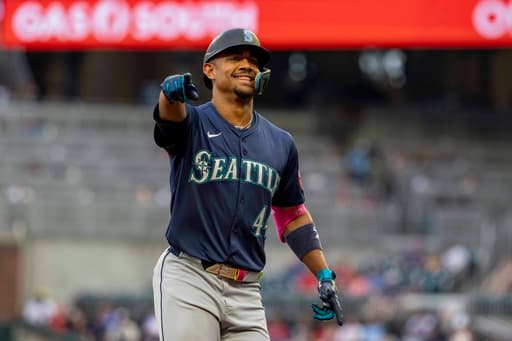 Rodríguez hits 2 homers, Raleigh gets his 52nd, and Mariners down Braves 10-2