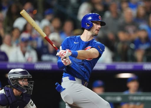 Tucker and Assad power Cubs to a 4-3 win over the Rockies
