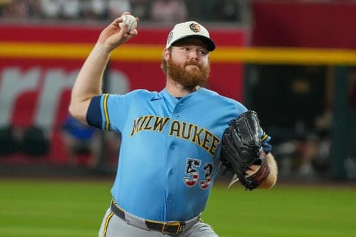 FILE - Milwaukee Brewers pitcher Brandon Woodruff works against the Arizona Diamondbacks during the first inning of an baseball game, July 4, 2026, in Phoenix. (AP Photo/Darryl Webb, File) (AP Photo/Darryl Webb)