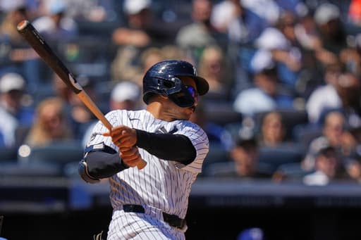 Grisham leads Yankees over Rangers 9-2 for 16th win in 19 games but Domínguez hurt hitting wall