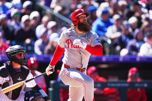 Marsh helps power 7-run first inning as Phillies beat Rockies 10-1 in Colorado’s home opener