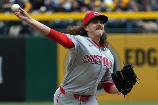 The Reds tie an MLB record by walking seven straight batters in a 17-7 loss to the Pirates