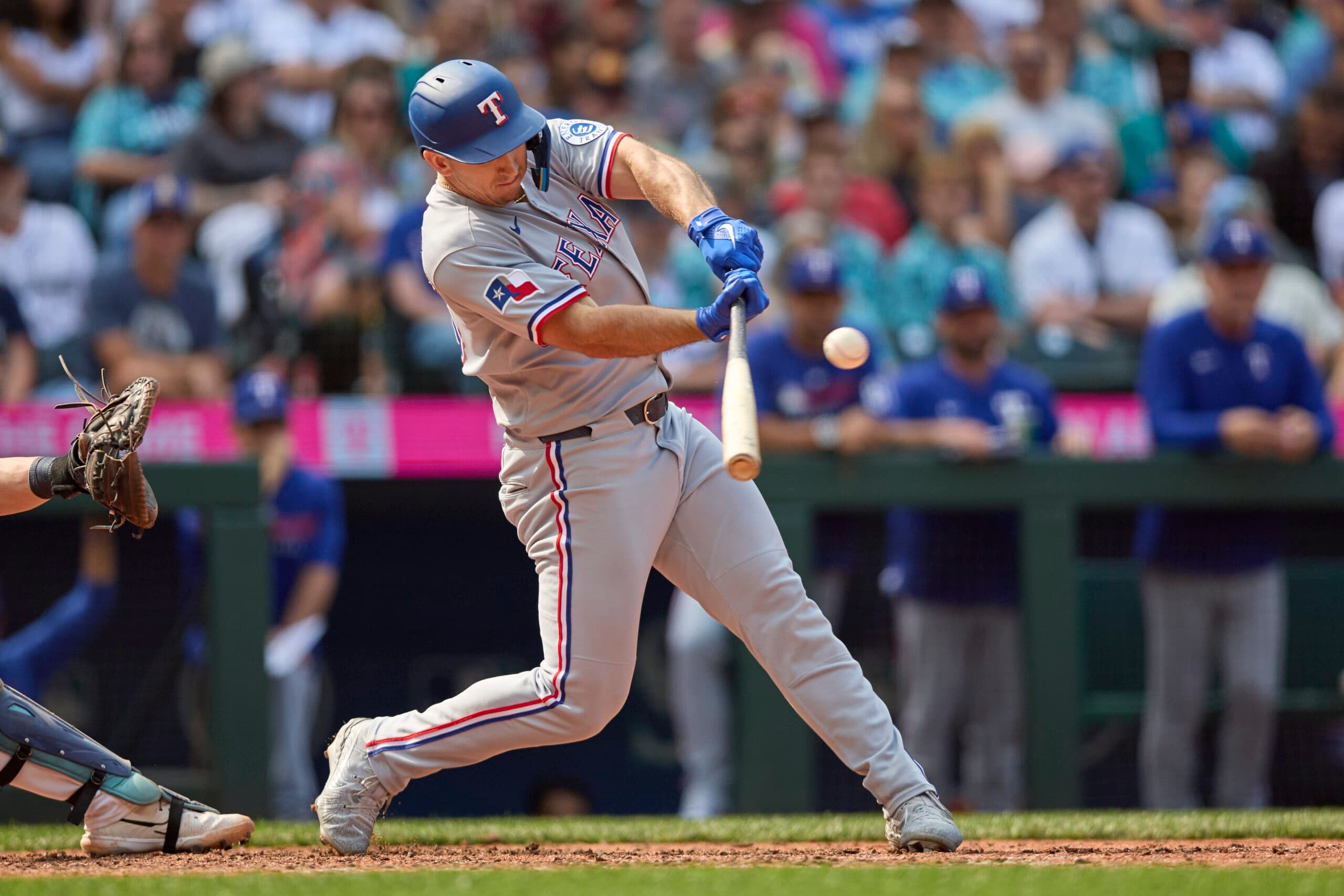 Wyatt Langford helps the Texas Rangers beat the Seattle Mariners 6-4 in 11 innings