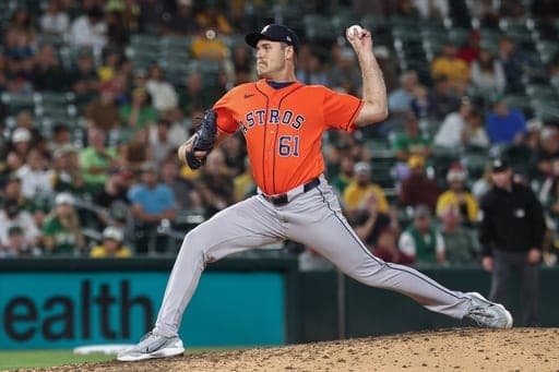 Houston Astros pitcher Josh Henderickson throws a ball to the Athletics during the eighth inning of a baseball game in West Sacramento, Calif, Friday, Sept. 25, 2026. (AP Photo/Sara Nevis) (AP Photo/Sara Nevis)