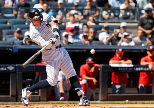 Yankees hit 4 home runs in a 9-run inning to rout Nationals 11-2