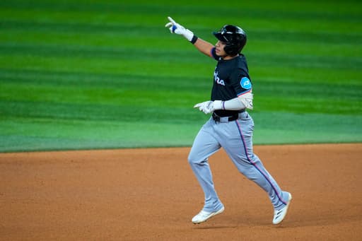 Marlins beat Rangers 6-4 in 12 innings for fourth straight win