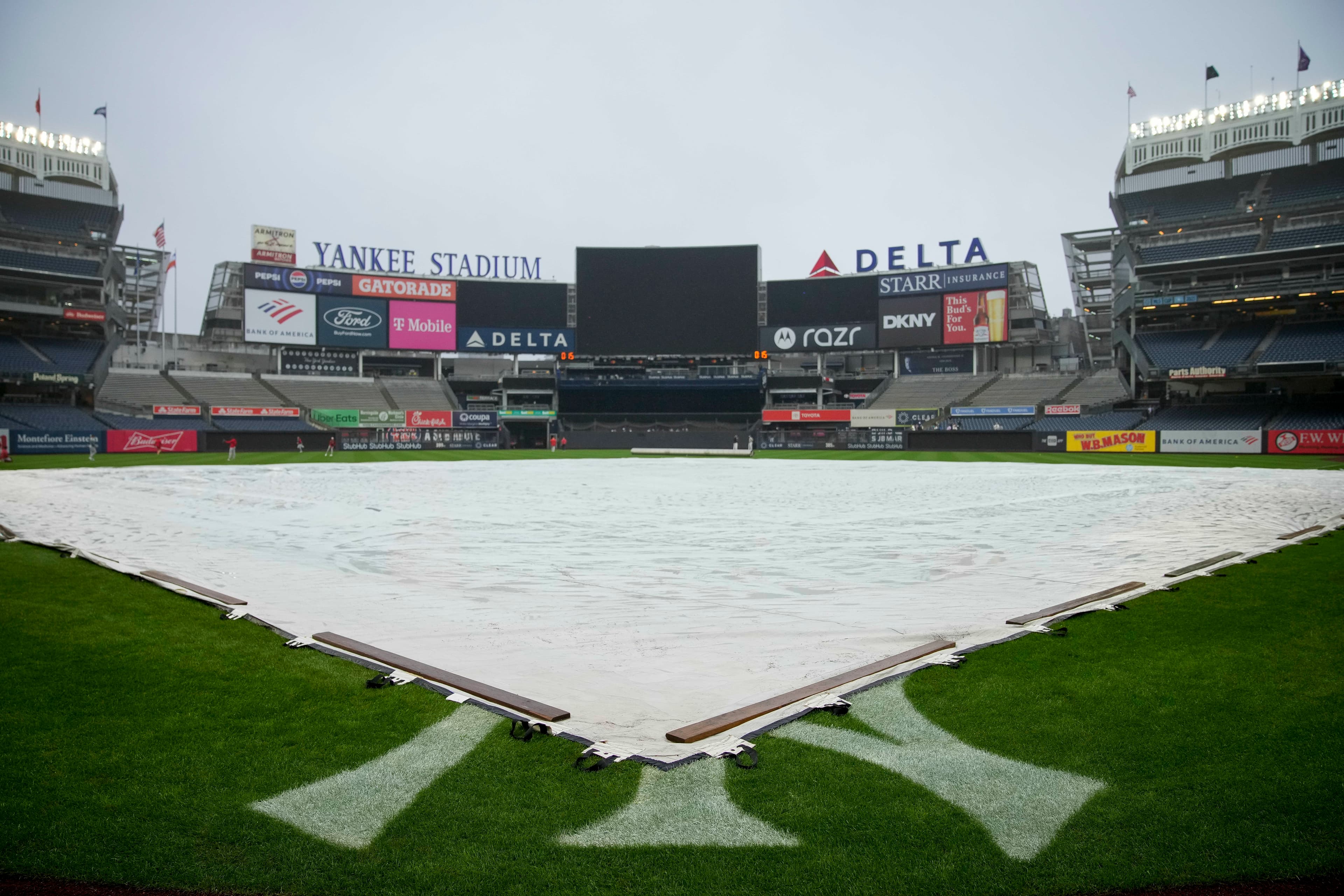 Dodgers and Yankees rained out, rescheduled as part of day-night doubleheader Sunday